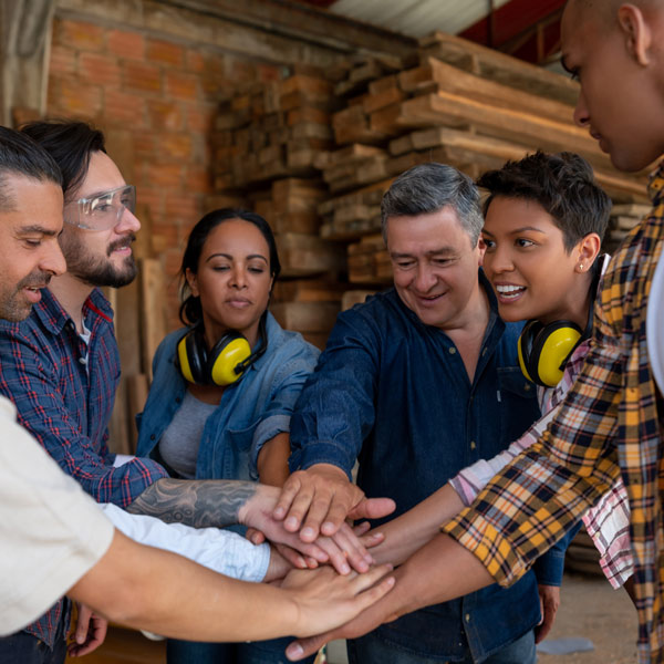 labor workers having a team huddle
